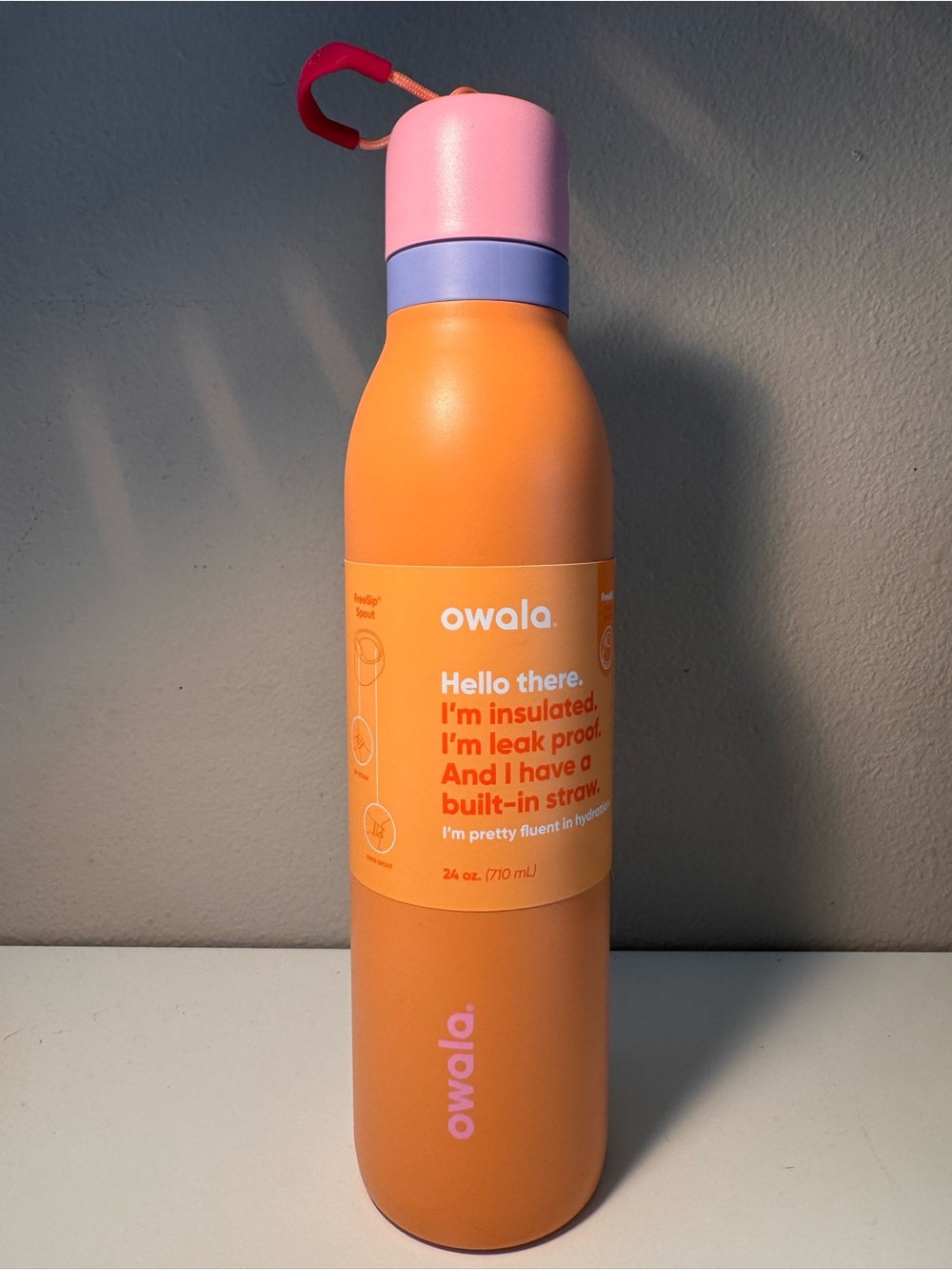 owala Insulated Orange Stainless Steel Water Bottle with Pink Cap